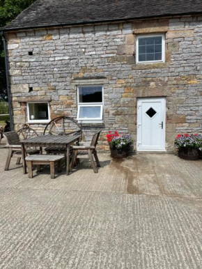 The Shippon Farm stay with shared toilet, shower and washing facilities